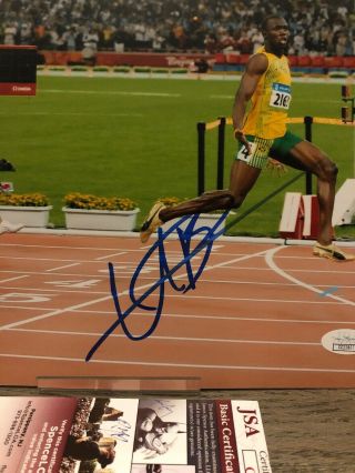 Usain Bolt signed 8x10 Photo Olympic Gold Run JSA RARE Autographed 2