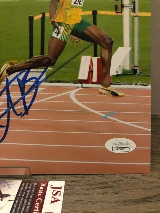 Usain Bolt signed 8x10 Photo Olympic Gold Run JSA RARE Autographed 3