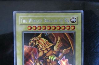 Yu - Gi - Oh The Winged Dragon of Ra GBI - 003 Secret Rare Card ScR English E75 2