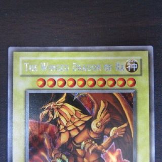 Yu - Gi - Oh The Winged Dragon of Ra GBI - 003 Secret Rare Card ScR English C282 2