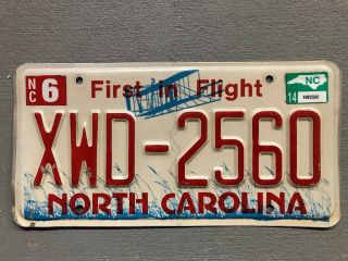 Vintage North Carolina License Plate First In Flight Xwd - 2560 Red Letter Rare