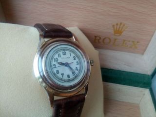 RARE VINTAGE GENTS 9K GOLD ROLEX SOLAR WATCH,  AND KEEPING TIME. 12