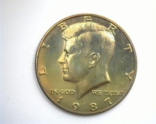 1987 - P Kennedy 50 Cents Exceptional Uncirculated,  Rev.  Rainbow Rare This