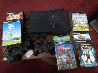Playstation 2,  Memory Card,  2 Controllers,  7 Games (some Rare Titles)
