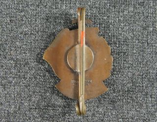 Rare 1934 Ulster TT bronze pin badge made by the Birmingham Medal Co. 2