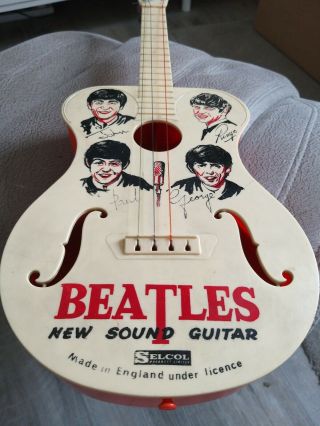 A Very Rare Selcol Beatles Plastic Guitar Toy,  1964