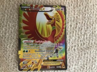 30 Pokémon trading cards including ultra rare mcharizard and HO - OH 2