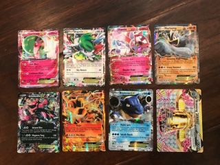 30 Pokémon trading cards including ultra rare mcharizard and HO - OH 6