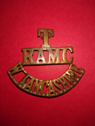 Rare Ww1 R.  A.  M.  C.  West Lancashire Territorials Brass Shoulder Title