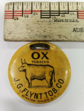 Ox Tobacco.  Old Celluloid.  I Think Rare.  Google J.  G.  Flynt Tobacco Company.