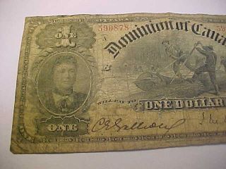 1897 DOMINION OF CANADA $1 NOTE COURTNEY,  RARE ONES INWARD CIRC LARGE NOTE 2