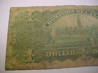 1897 DOMINION OF CANADA $1 NOTE COURTNEY,  RARE ONES INWARD CIRC LARGE NOTE 7