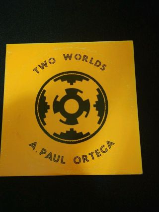 A.  Paul Ortega Two World 