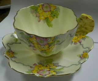 Paragon England Bone China " Maylime " Tea Cup & Saucer Flower Handle / Rare Reg.