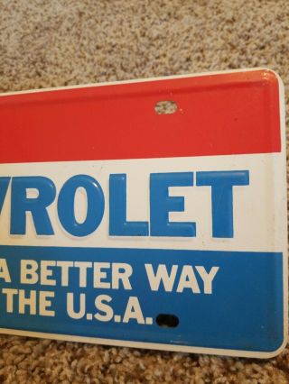 Chevy License Plate BUILDING A BETTER WAY TO SEE THE USA 1 Rare TAG 60S OR 70S 4
