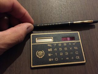 Cadillac Vintage Rare Parts.  Pen And Calculator