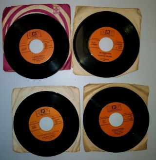 Four Rare Vintage Robert Pulido Y Los Clasicos 45 Rpm Records Songs Are Listed