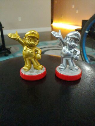 Rare Nintendo Gold Mario And Silver Mario Amiibo.  Fast