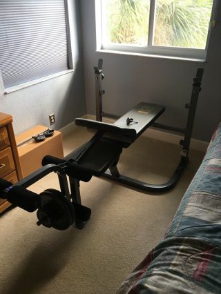 Weider weight bench with rack,  weights not.  Rarely. 2