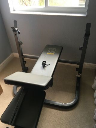 Weider weight bench with rack,  weights not.  Rarely. 3