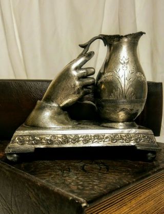 Antique Wilcox Silver Plate Co.  Hand Holding Pitcher On Stand Rare.