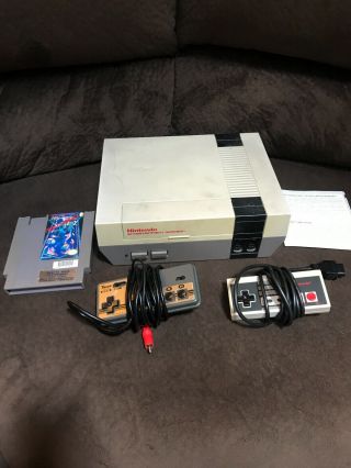NES game console with 1 game/2 controllers (1 rare joycard sansui sss) 2