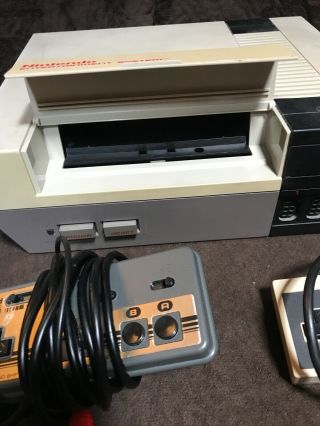 NES game console with 1 game/2 controllers (1 rare joycard sansui sss) 4