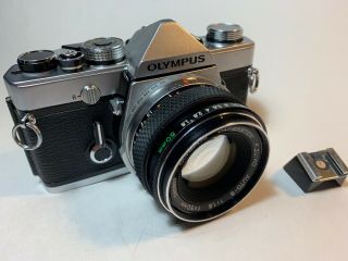 Olympus Om - 1 35mm Slr Comes With 50mm F/1.  8 Lens And Rare Shoe Attachment.