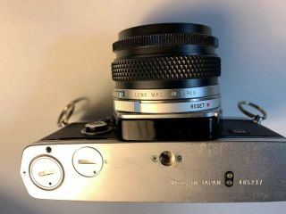Olympus OM - 2 35mm Camera.  C/W 50mm F/1.  8 lens & rare detach hot shoe.  “Lot 123” 5