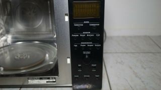 BLACK / GE CONVENTIONAL MICROWAVE / OVEN JE 1590BC 001 - RARELY 2