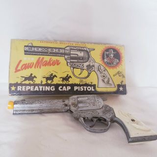 Rare Kenton " Law Maker " Repeating Cap Pistol,  White Grips.  1930 