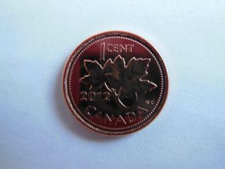 1 - 2012 ROLL COPPER PLATED STEEL CANADIAN PENNY VERY RARE MAGNETIC 2