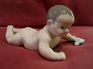 Rare Royal Copenhagen Figurine Baby Crawling With Sock In Hand 1739