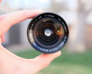 Exc,  Bushnell 28mm F2.  8 M42 Pentax Mount Camera Lens Very Rare