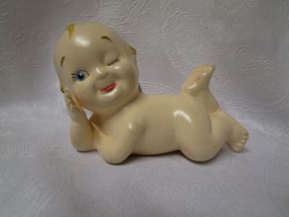 Vintage Rare Germany Kewpie Porcelain Doll.  Laying On Side Winking.