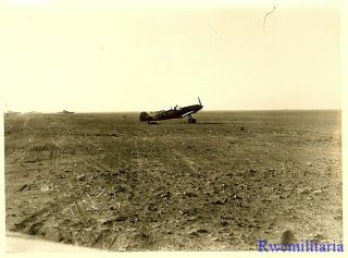 Port.  Photo: RARE Luftwaffe Me - 109 Fighter Planes Dsipersed in Open on Airfield 2