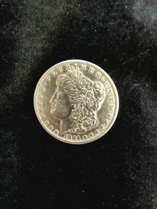 1884 S Morgan Silver Dollar.  Looks Au.  Rare Key Date Coin.