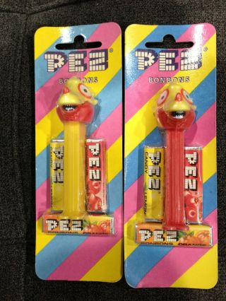 Pez Dispensers Set Of Two Dinosaurs On Rare Striped European Cards Moc