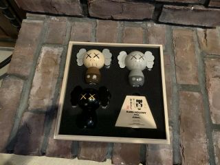 KAWS: HOLIDAY JAPAN Limited Wood Kokeshi Doll Set (set Of 3) In Hand. 2
