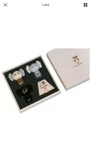Kaws Holiday Japan Limited Kokeshi Doll Set (set Of 3) Order Confirmed