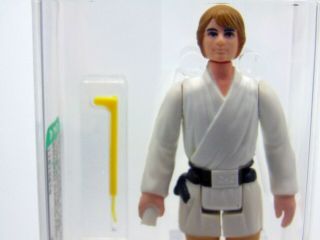 1977 Star Wars Luke Skywalker Brown Hair,  Dark Pants,  HK,  AFA 85 NM, 2