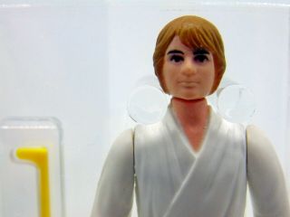 1977 Star Wars Luke Skywalker Brown Hair,  Dark Pants,  HK,  AFA 85 NM, 3