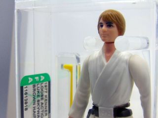1977 Star Wars Luke Skywalker Brown Hair,  Dark Pants,  HK,  AFA 85 NM, 5