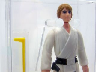 1977 Star Wars Luke Skywalker Brown Hair,  Dark Pants,  HK,  AFA 85 NM, 7