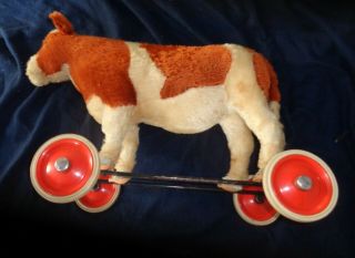 Steiff Germany cow or steer pull toy Signed on wheel 2