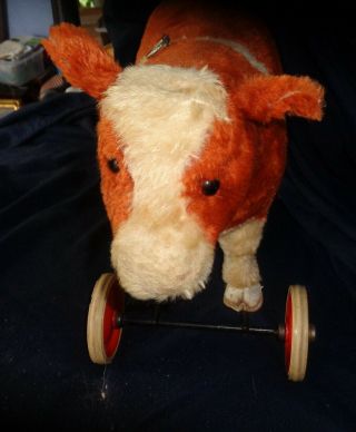 Steiff Germany cow or steer pull toy Signed on wheel 5