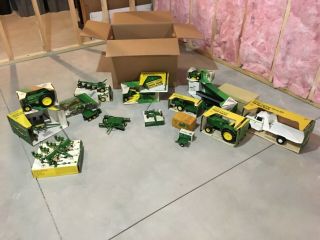 ertl john deere toy tractors with boxes all as a whole. 4