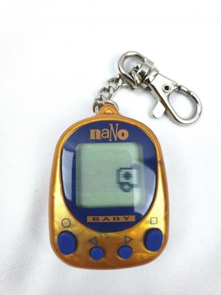 Nano Baby Playmates Virtual Pet 1997 Orange with Blue Frame | Tamagotchi 3