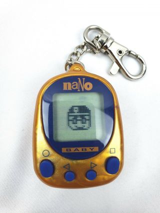 Nano Baby Playmates Virtual Pet 1997 Orange with Blue Frame | Tamagotchi 4