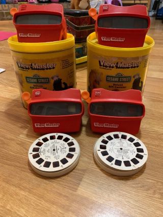 2–1982 Sesame Street View - Master Deluxe Gift Canisters 4 View Masters/30 Reels